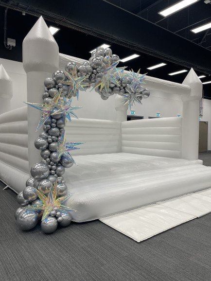 Our stunning white bouncy castle . Here is a picture of it at Farnborough Airport for an event . We can decorate it in any theme you like. This is the biggest White Castle in the UK . It’s immaculate. It can be used for Weddings or Luxury Kids parties.