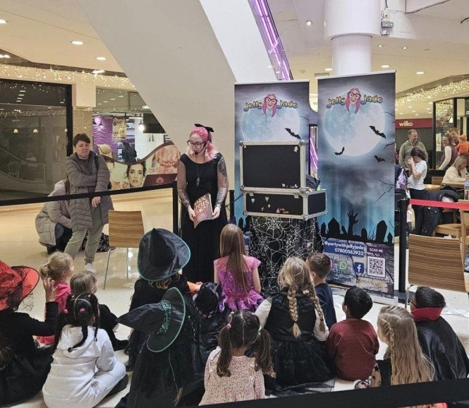 Jelly Jade entertains at a Halloween show in the Mercury Mall, Romford to an audience of 25 children