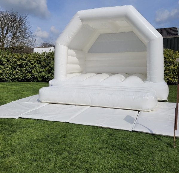 White adult bouncy castle, ideal for weddings and more