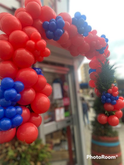 A balloon garland to celebrate a restaurants birthday in style.